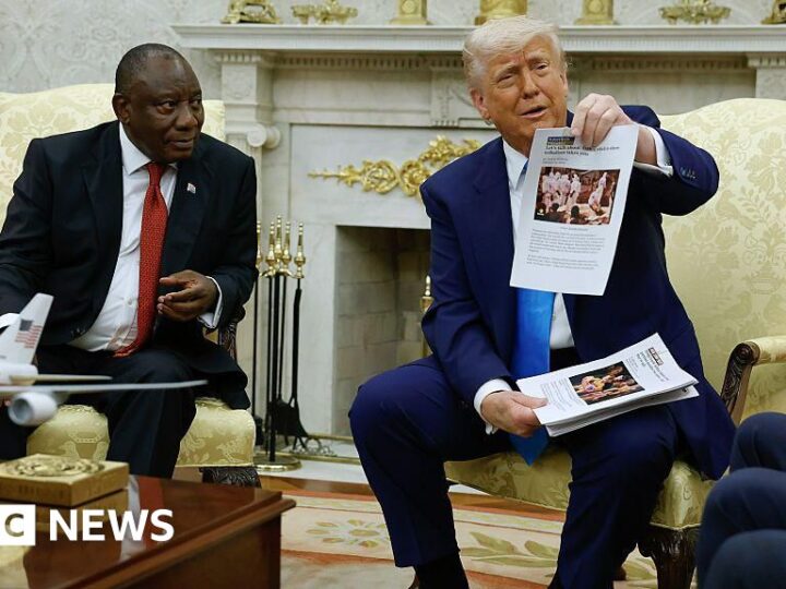 Trump sets refugee admissions cap for coming year at record low