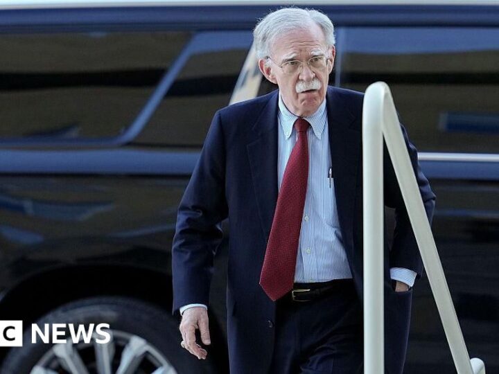 Ex-Trump adviser Bolton surrenders to face charges of sharing classified documents