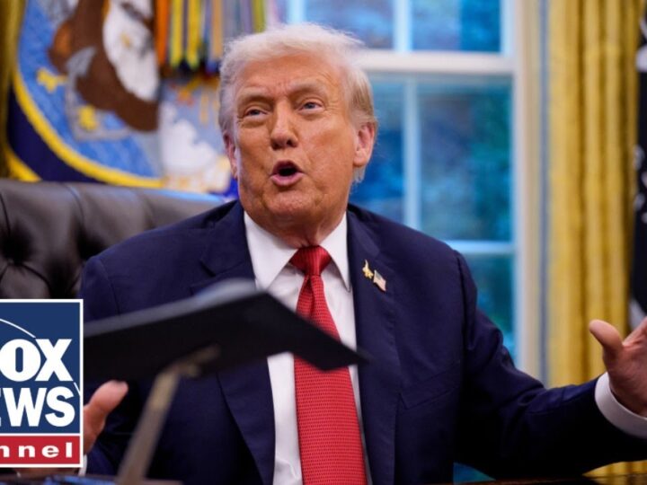 President Trump signs executive orders from the Oval Office