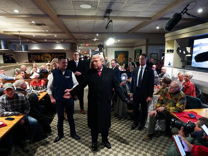 President Donald Trump receives prayer from Iowa restaurant patron